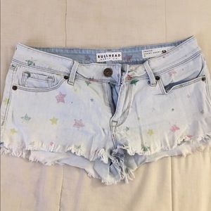 PacSun lowrise jean shorts with stars on them